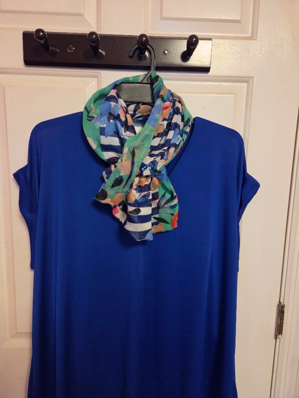 Royal blue blouse with infinity scarf.